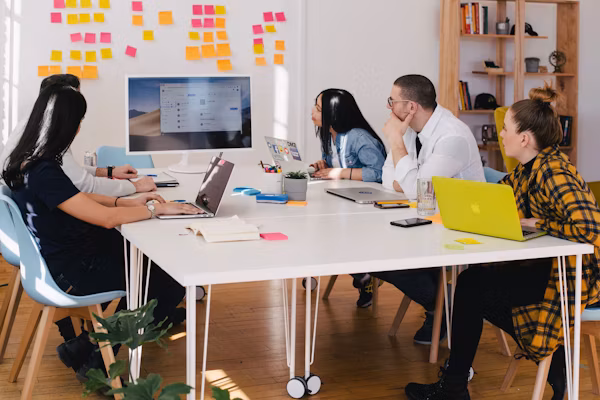 Digital marketing team collaborating on strategies for brand growth